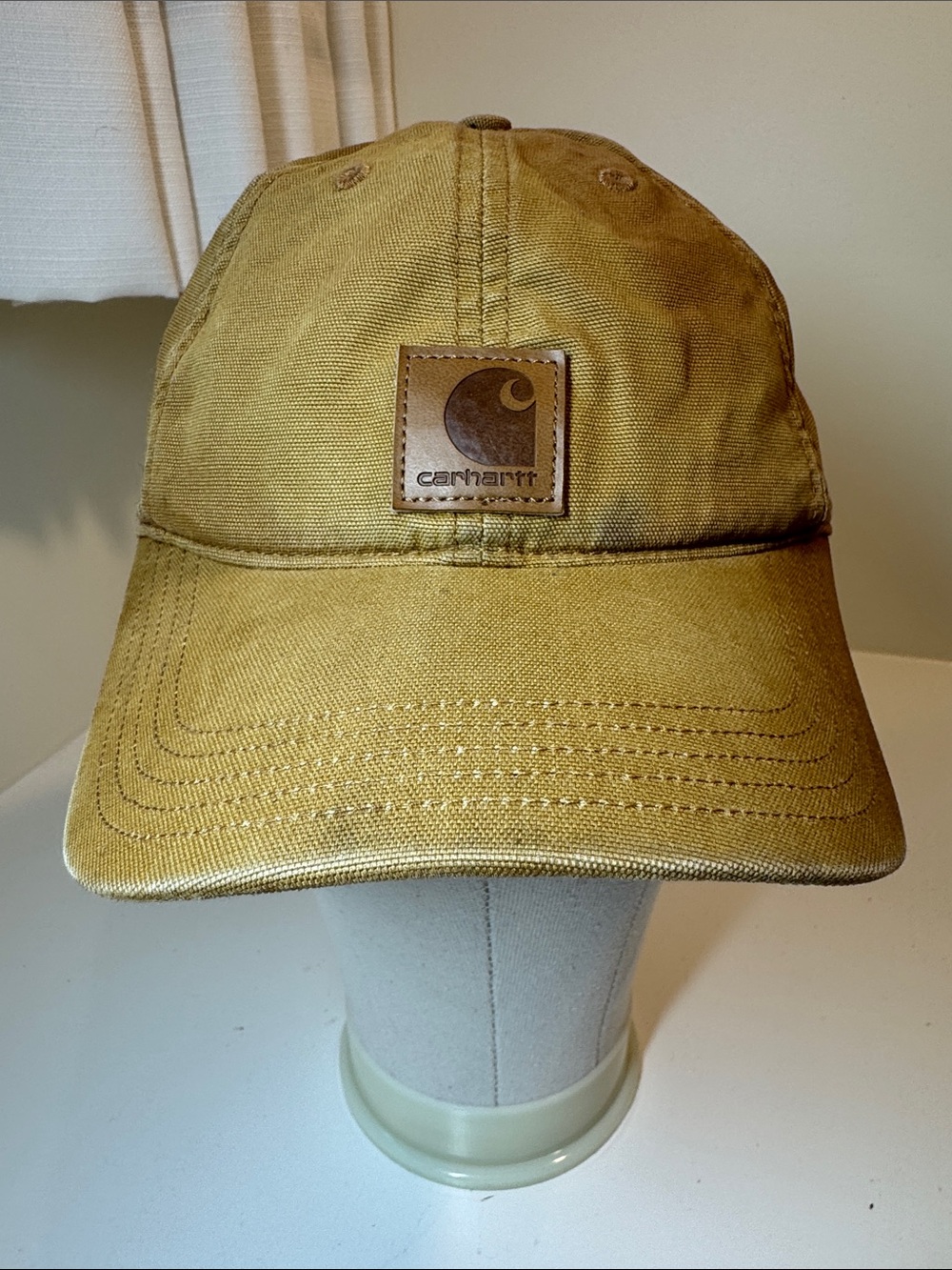 Carhartt dark tan ball cap.